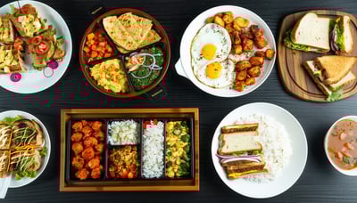 A variety of breakfast, sandwiches, rice bowls, and Indian snacks from A1 Brunch House